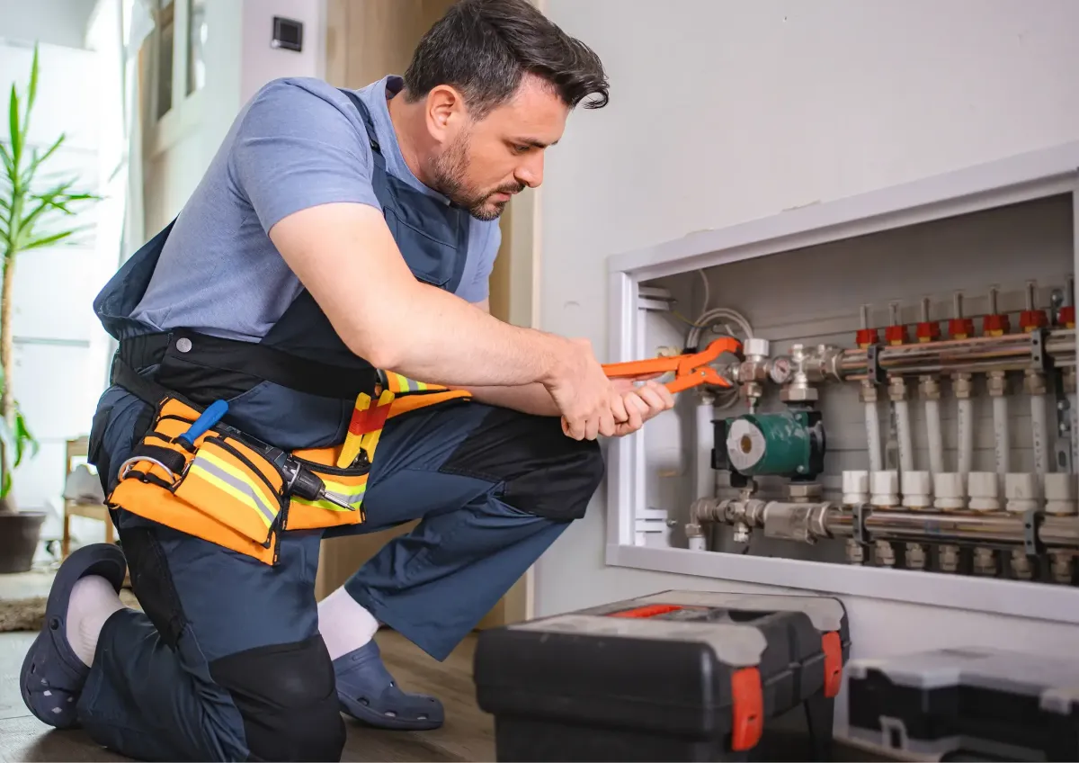Professional plumber repairing residential plumbing
