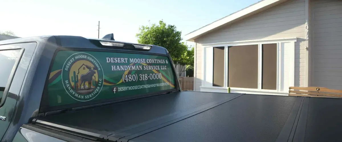 Desert Moose Coatings and Handyman Service branded truck with company details