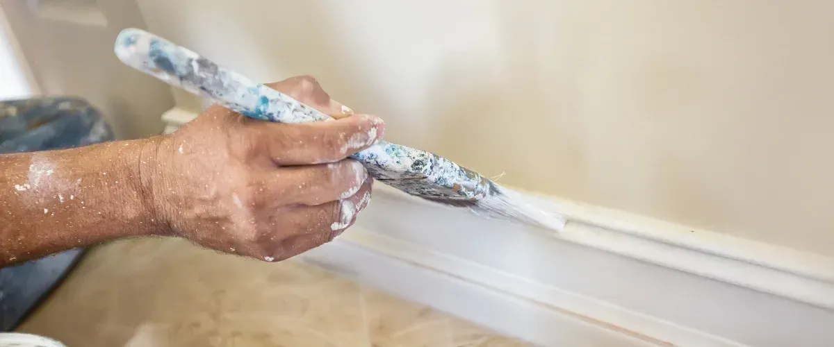 Desert Moose Coatings and Handyman Service LLC truck window logo and contact information