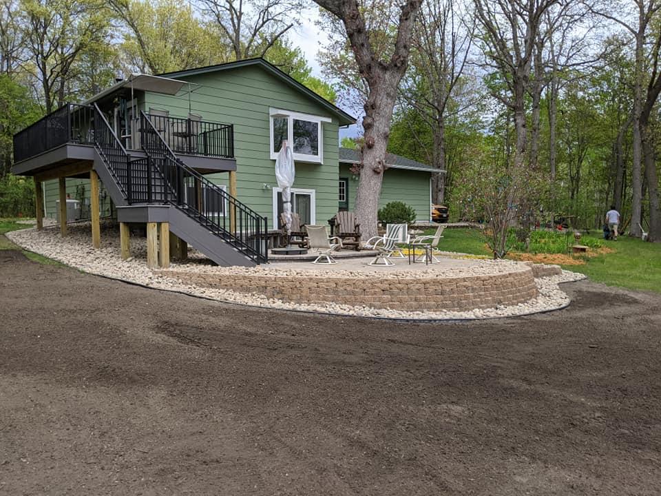Tiered retaining wall with garden bed in Minneapolis backyard