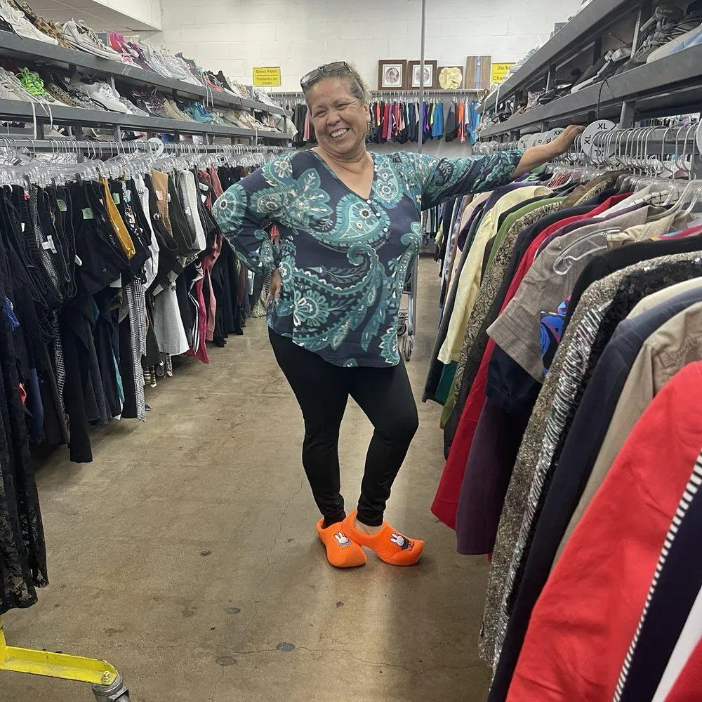 Curated thrift outfit displayed in H-Town Resale boutique
