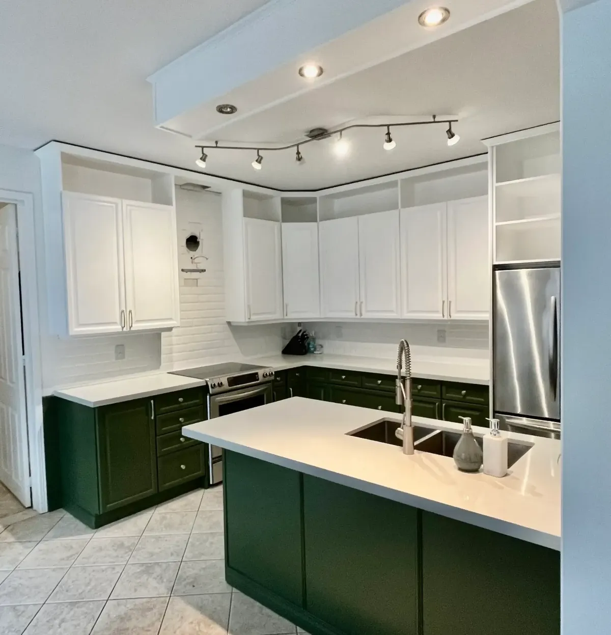 Professionally painted kitchen cabinet and interior painting project in Oshawa