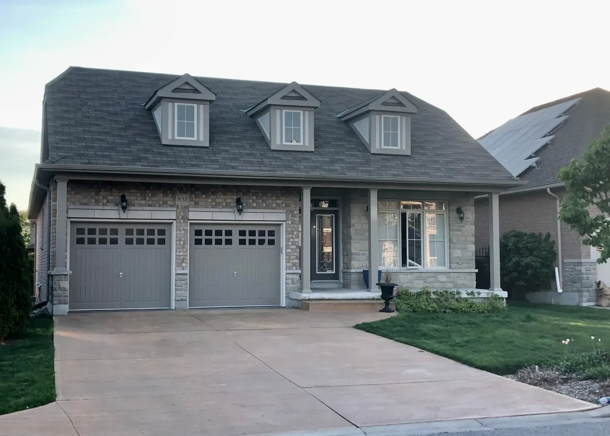 Professionally painted residential exterior for a Peterborough home by Altona Painting