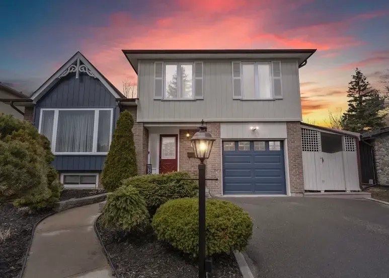Professionally painted exterior of a home in Cobourg by Altona Painting