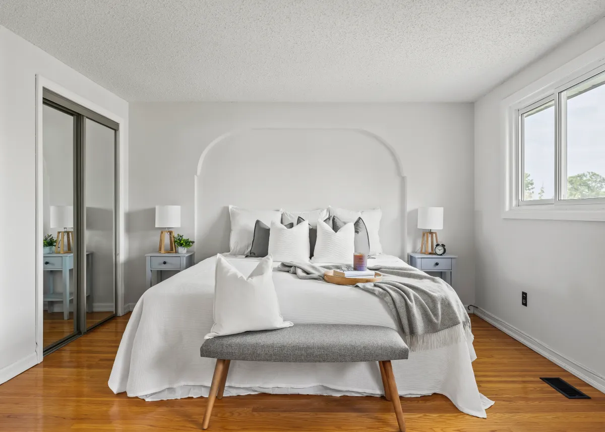 Bright neutral bedroom after professional painting in Newtonville Ontario
