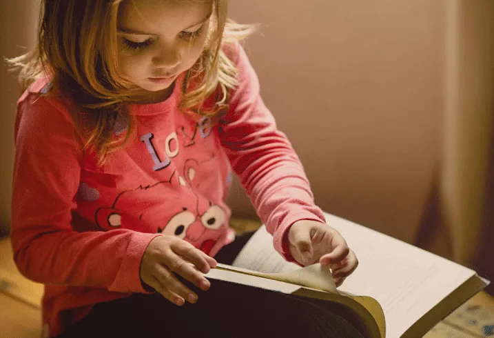 Kid with a book