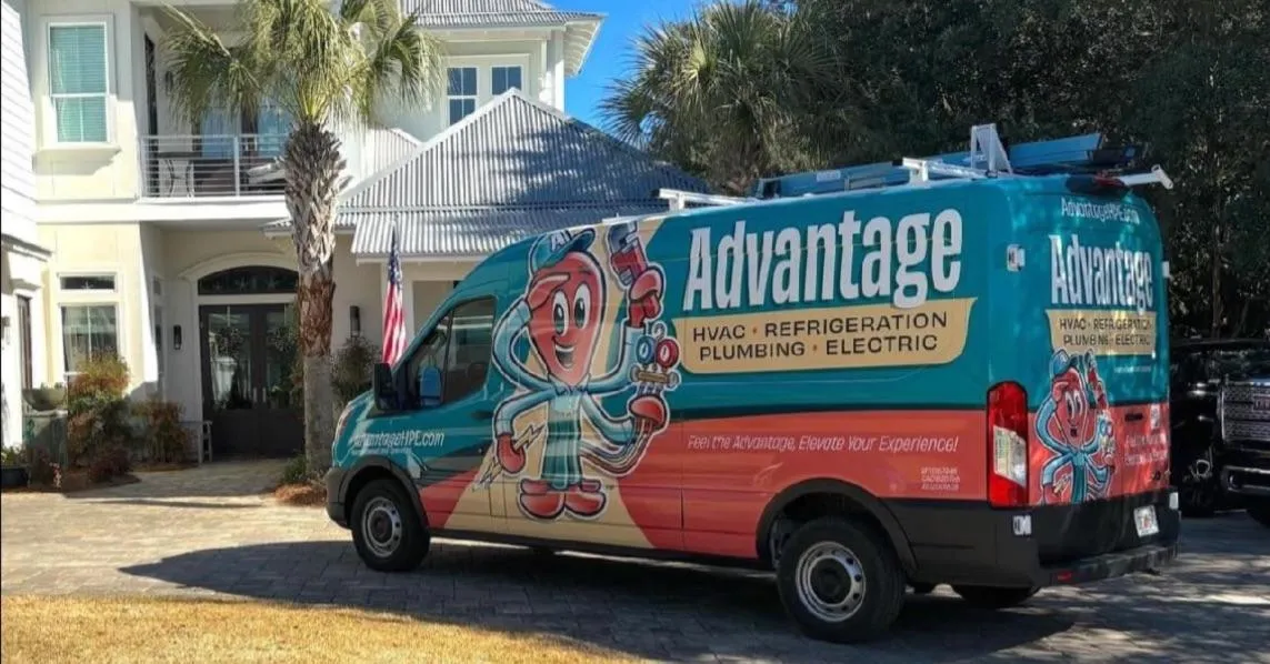 Advantage HVAC, plumbing, and electrical service van at a residential home in Destin, FL..
