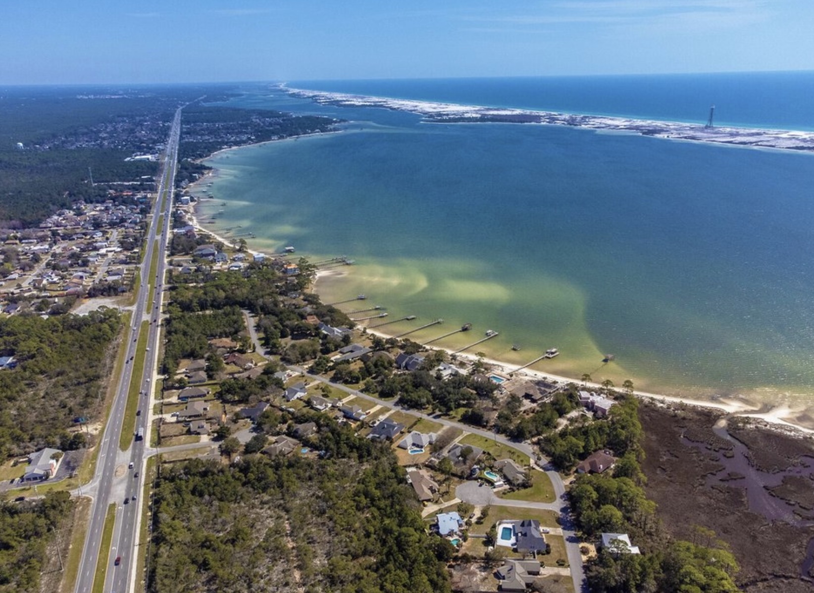 Aerial view of Mary Esther, Florida showing coastal neighborhoods along Choctawhatchee Bay near the Emerald Coast