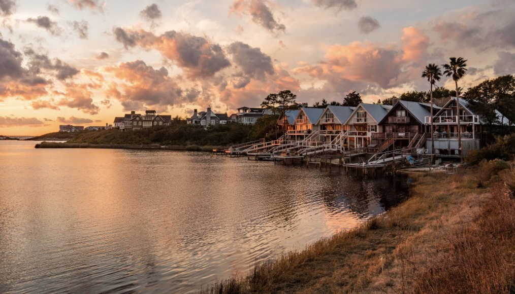 Scenic waterfront homes along the coast in Walton County, Florida at sunset