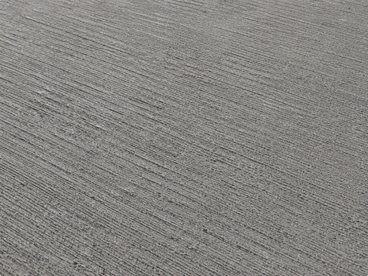 Broom-finished concrete driveway with textured surface for added traction.