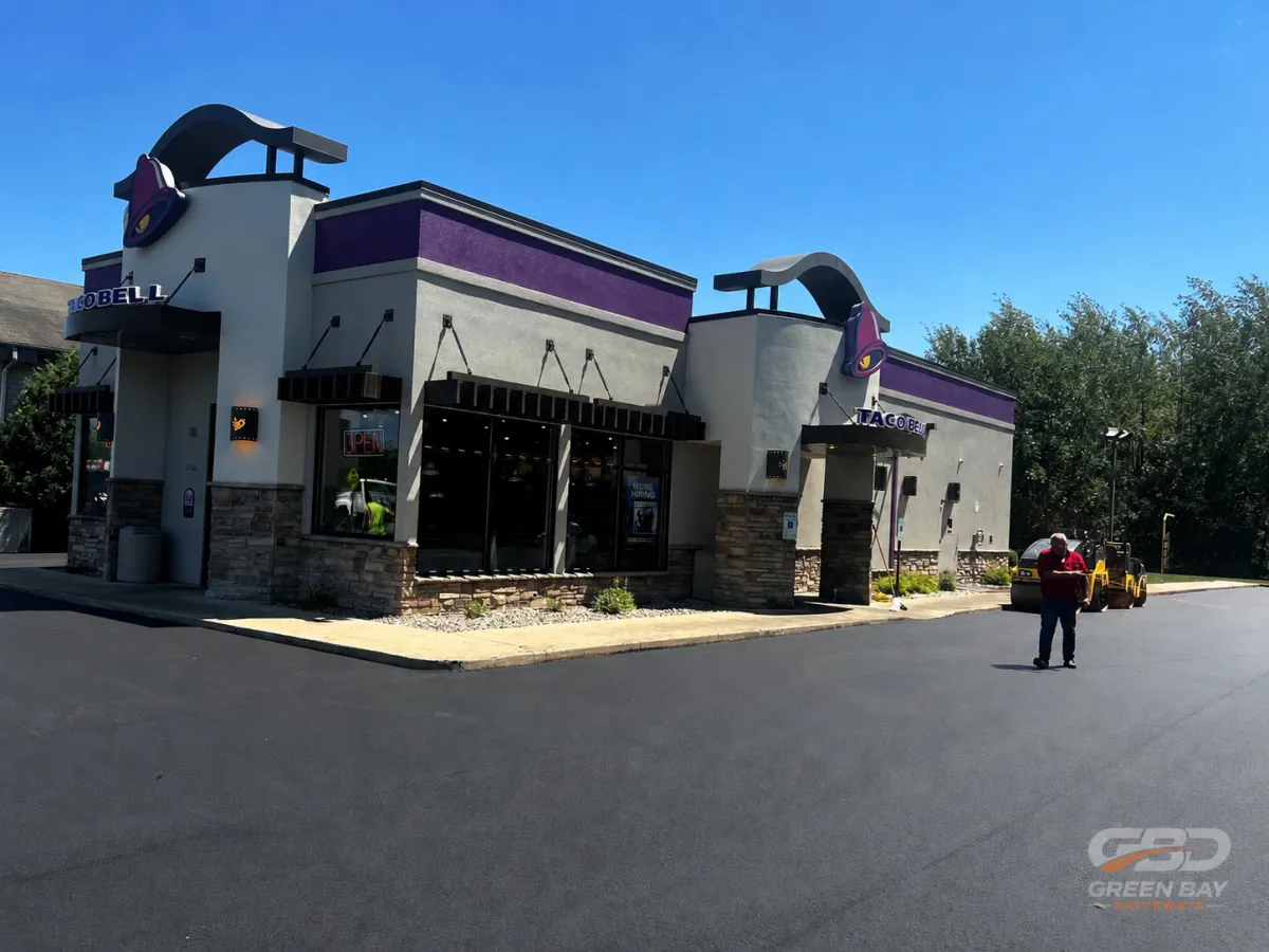 Taco Bell location with newly paved driveway and parking lot surface