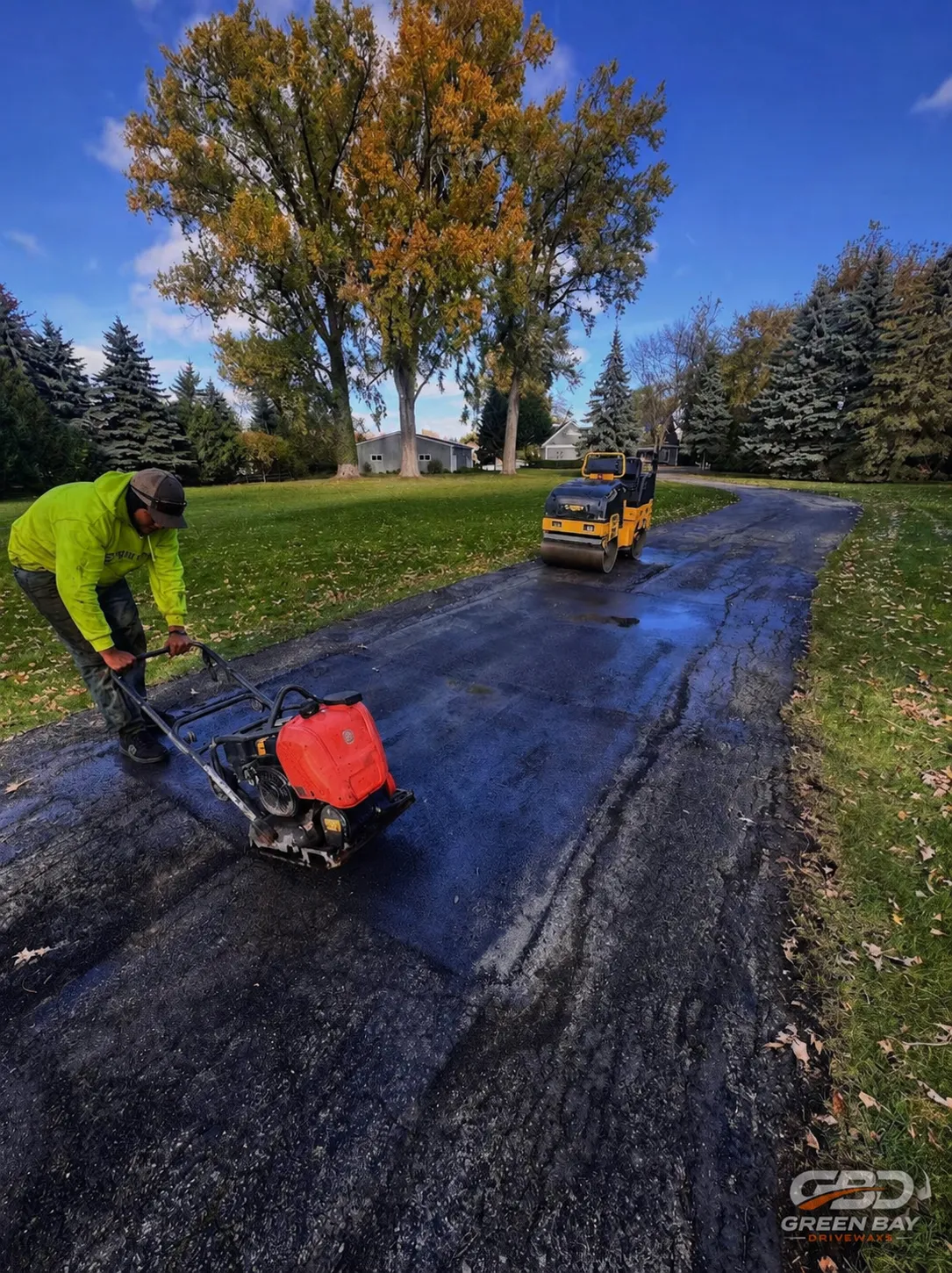 Roadway undergoing active asphalt repair and restoration work