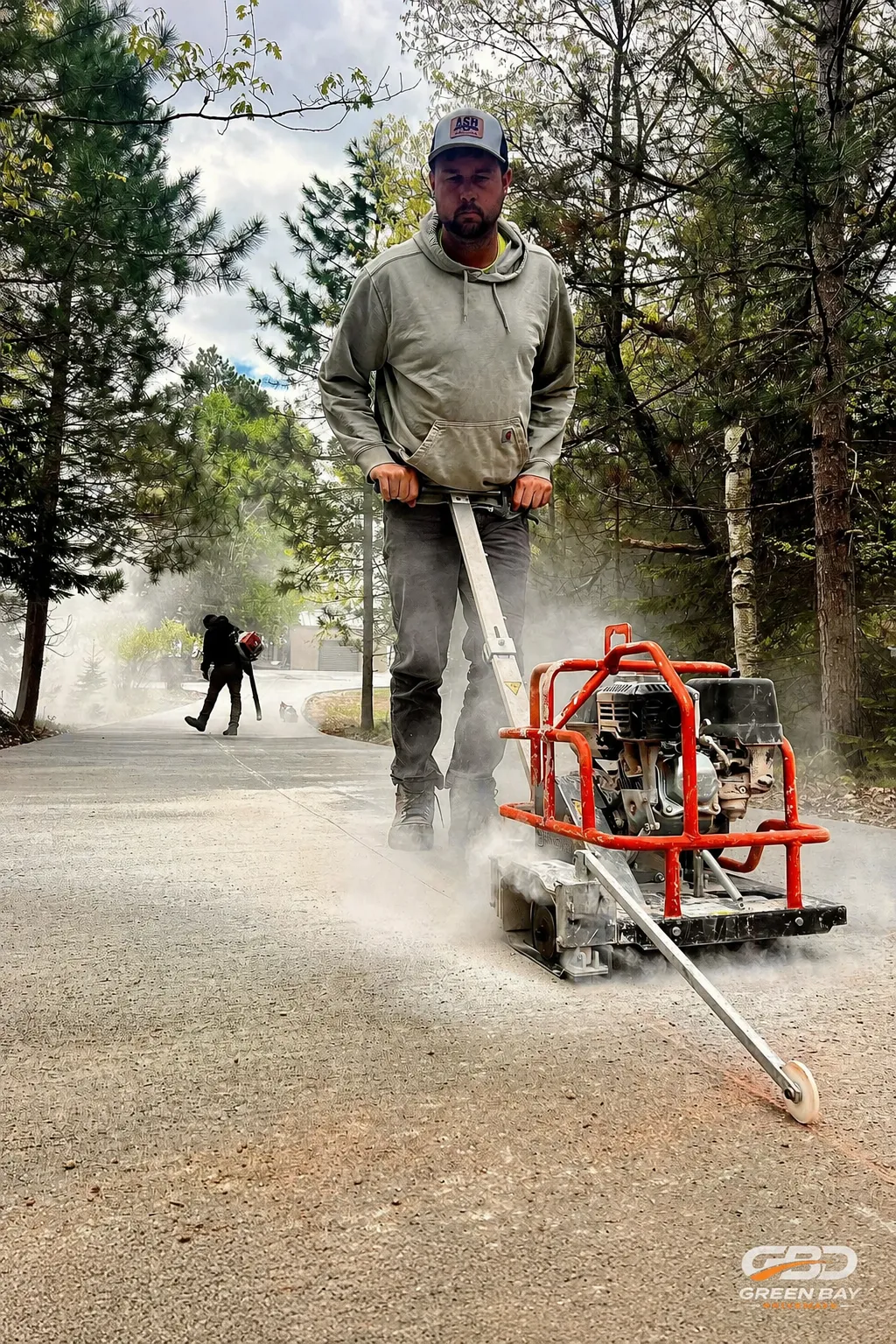 Worker cutting concrete in Green Bay, Wisconsin