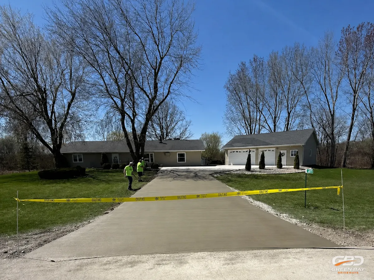 New concrete driveway surface after pouring and finishing work in Green Bay, Wisconsin