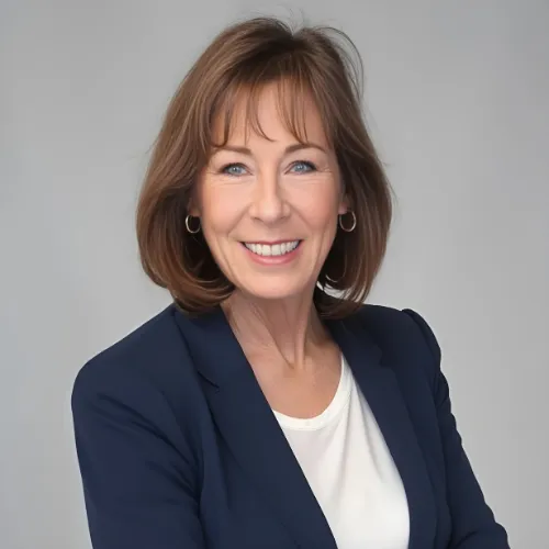 person wearing orange and gray Nike shoes walking on gray concrete stairs