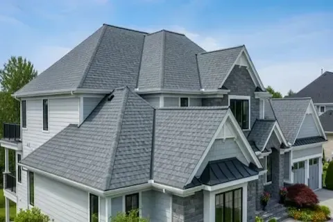Completed large residential roof with charcoal architectural shingles by Brooklyn Park Roofing Co