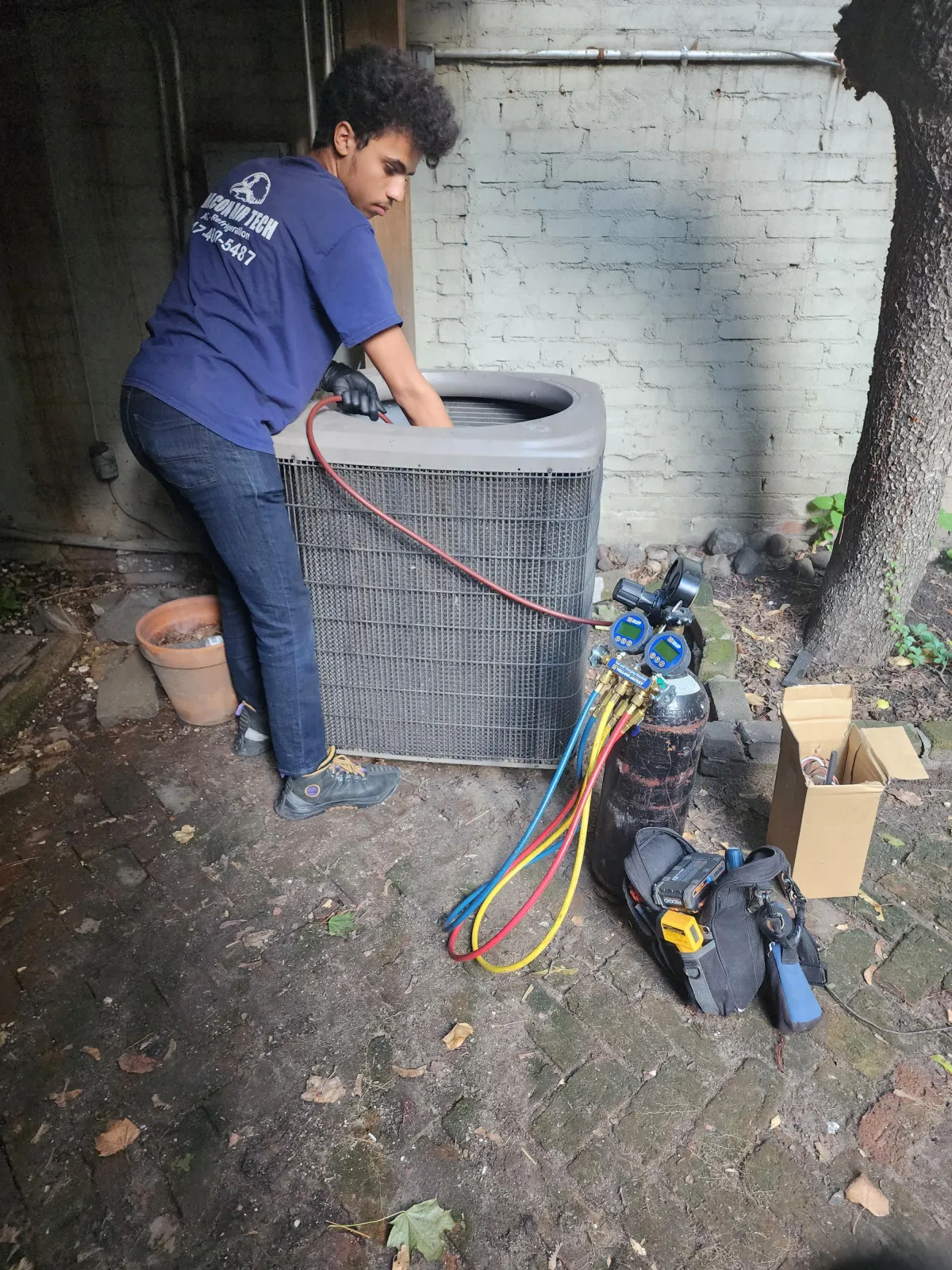 a cell phone sitting on top of a desk next to a keyboard