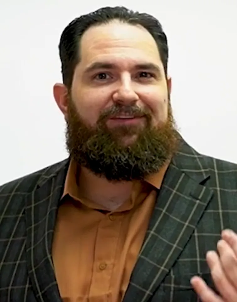 Warm professional portrait of Don Ray