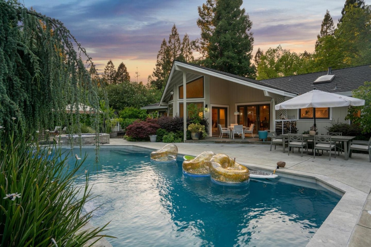 Welcome to a masterfully reimagined single-story estate in Blackhawks prestigious Hidden Oaks community