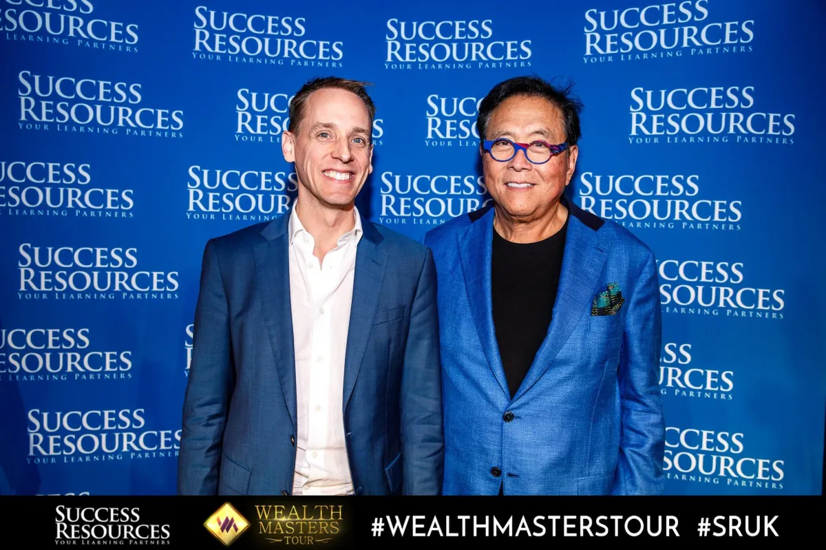 Alan P. Hill & Robert Kiyosaki teaching on stage together