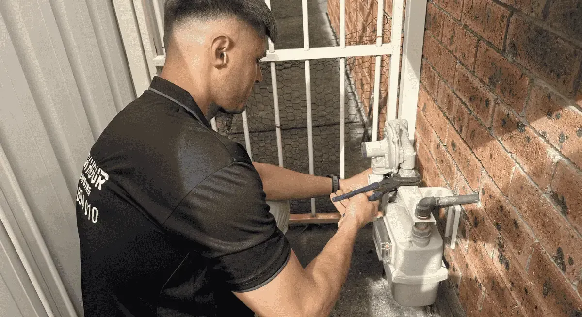 Licensed gas fitter testing gas lines at a residential property in St Clair