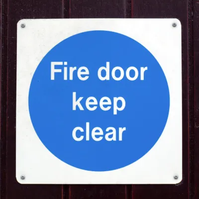 Fire door inspections and repair door sign