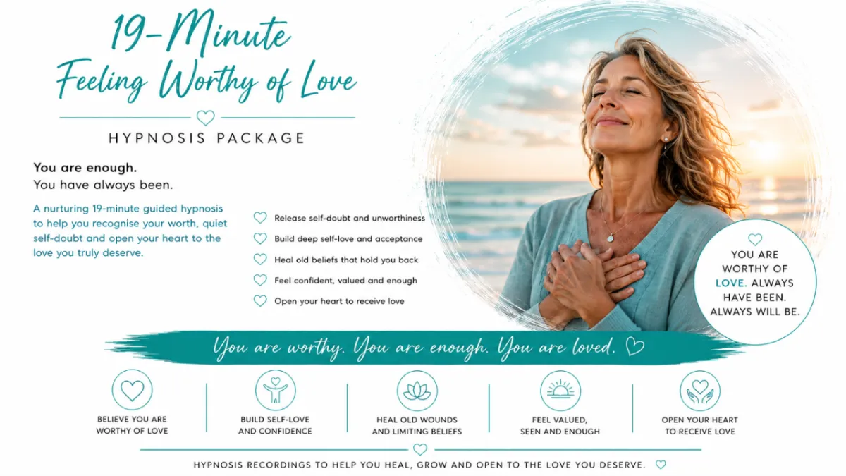 Woman standing peacefully by the sea with hands over her heart, symbolising self-worth, self-acceptance and feeling worthy of love.