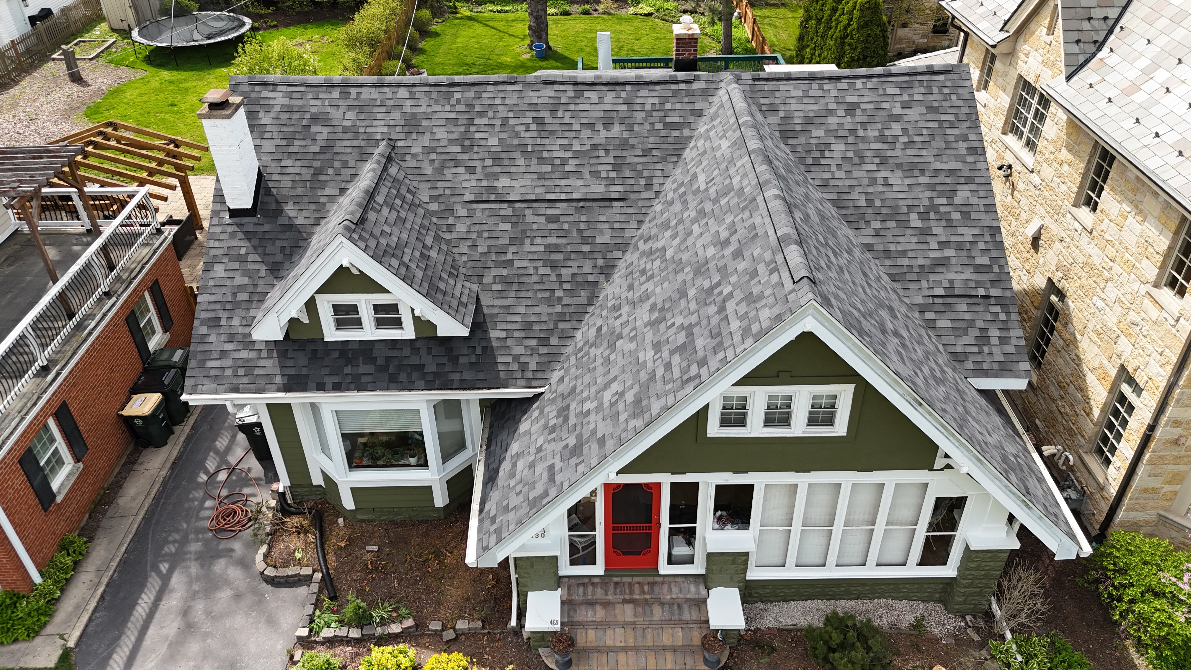 Malarkey Midnight Black shingle roof installed by Northwind Exteriors on a historic Sears Catalog home in Park Ridge, IL, preserving its charm with modern protection.