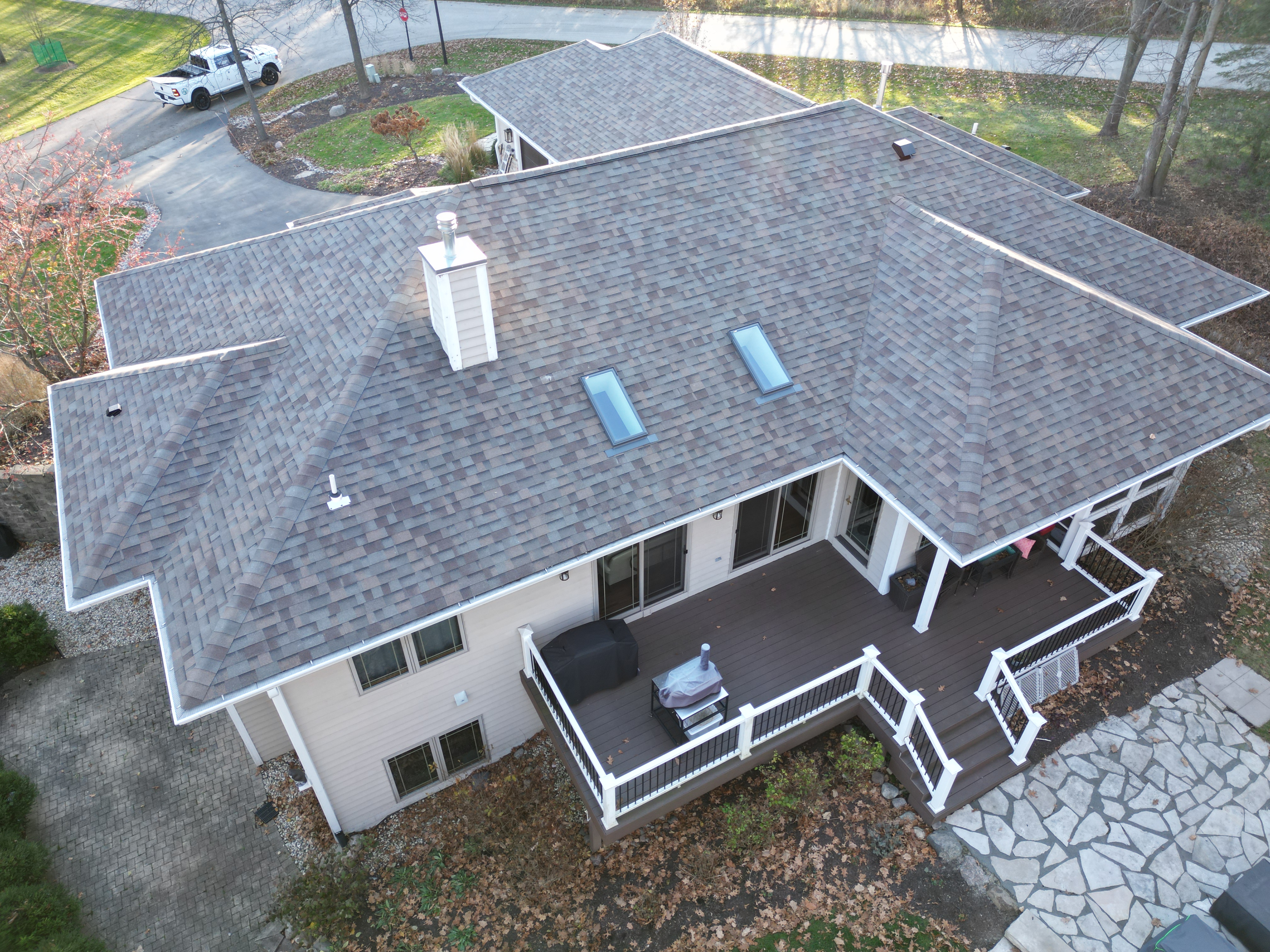 Malarkey Natural Wood shingle roof installed by Northwind Exteriors on a lakeside home in Williams Bay, WI, on Geneva Lake, blending natural charm with lasting protection.