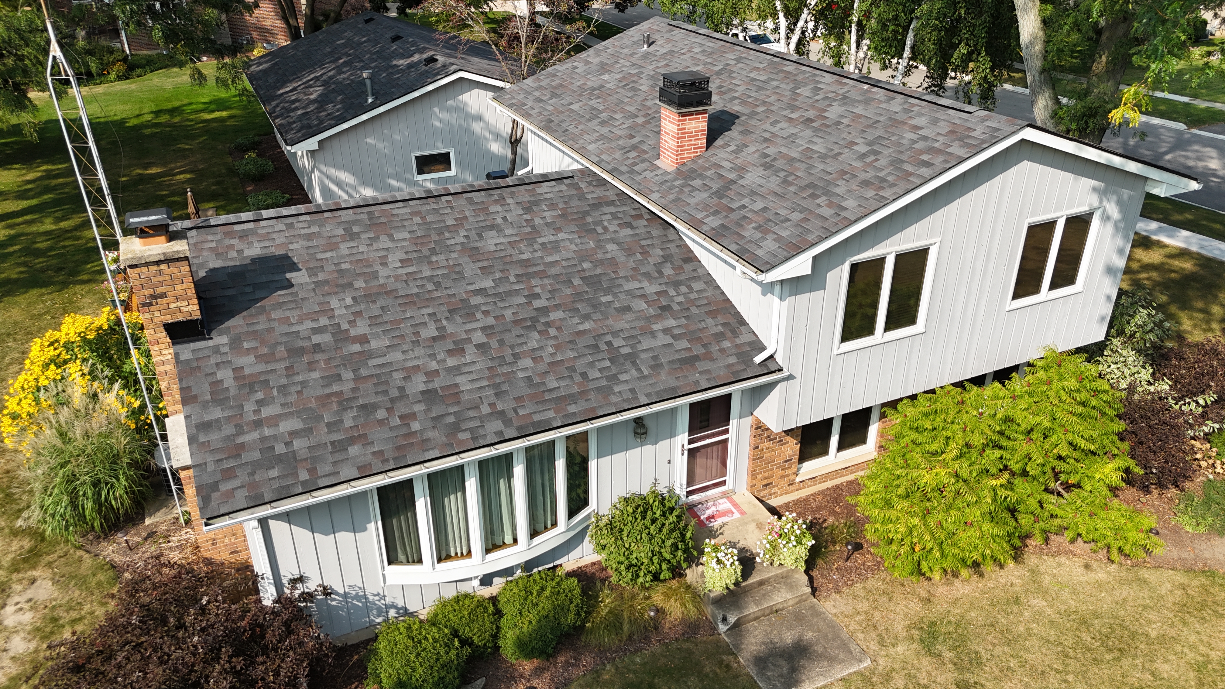 Malarkey Black Oak shingle roof installed by Northwind Exteriors on a home in Woodstock, IL, combining bold style with reliable weather protection