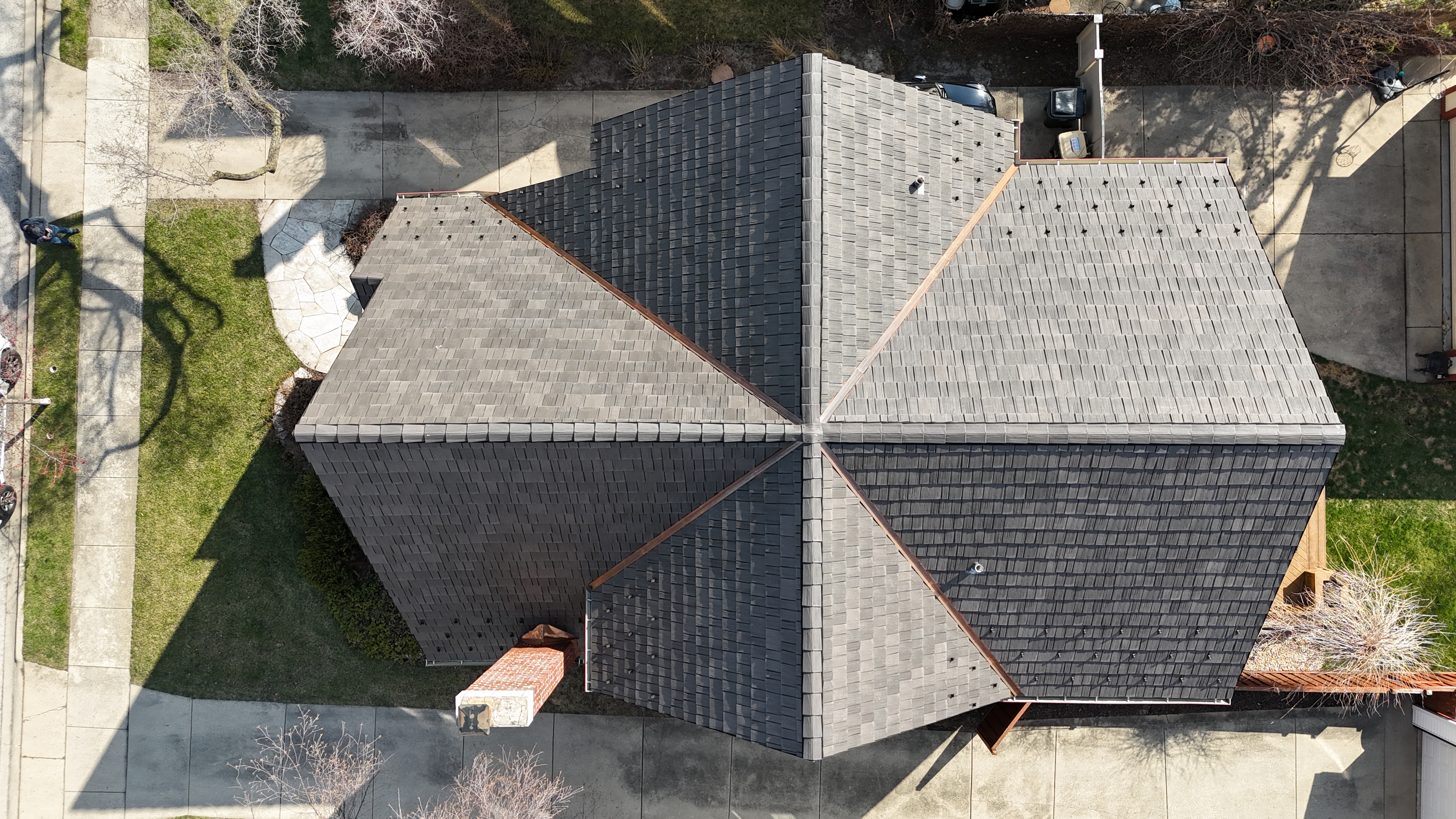 Elegant DaVinci Roofscapes composite slate roof installation on a residential home in Park Ridge, IL, showcasing durable, weather-resistant materials with a natural slate appearance.