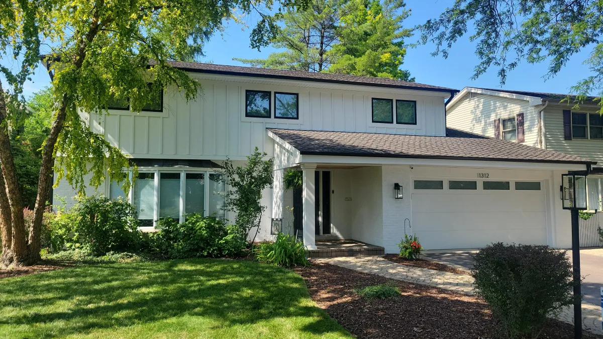 Black Vinyl Window from Midway Alliance installed by Northwind Exteriors in Park Ridge, IL.