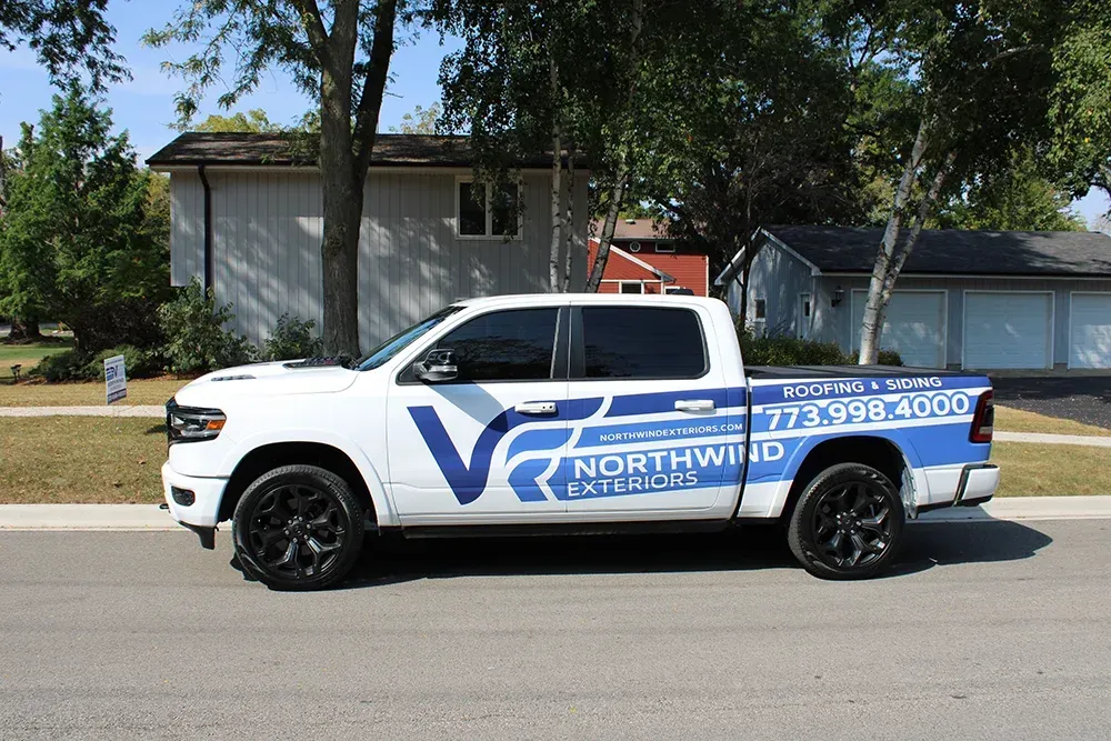 Northwind Exteriors’ branded truck parked in a Park Ridge neighborhood, highlighting local roofing and siding services.