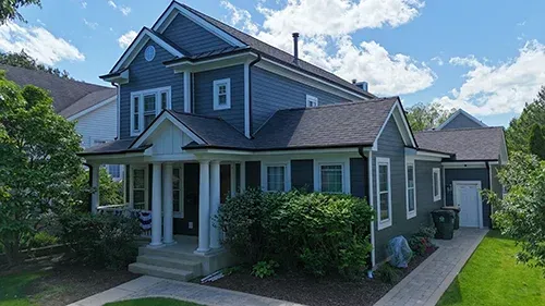 James Hardie siding and Malarkey Brilliant Black roof installed on a Park Ridge, IL Northshore IL