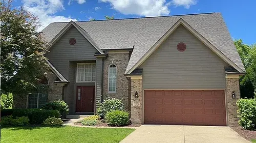 Timber Bark James Hardie siding with matching Timber Bark trim installed on a home in South Barrington, IL by Northwind Exteriors.