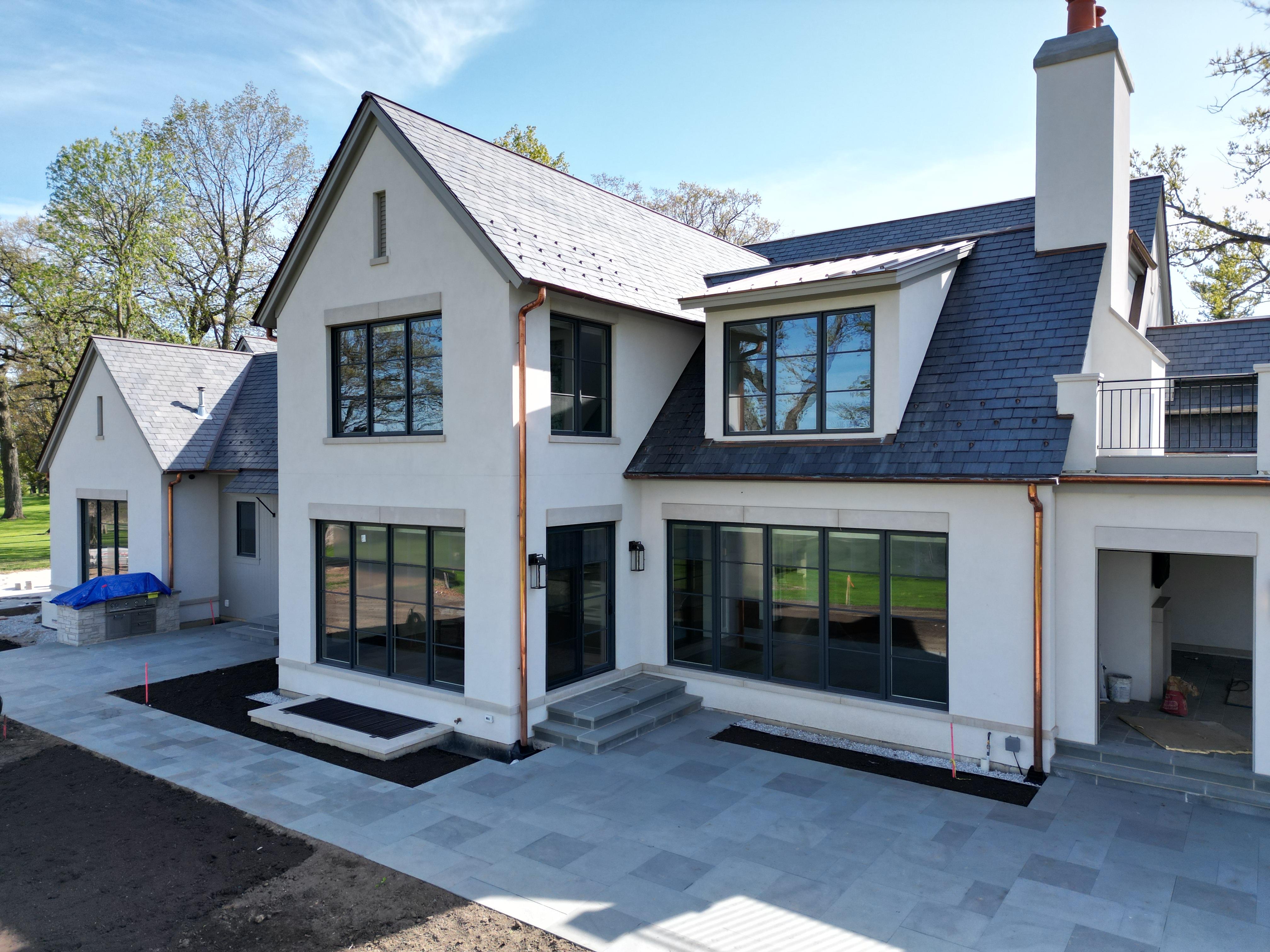 White Vinyl Window from Pella installed by Northwind Exteriors in Prospect Heights, IL.