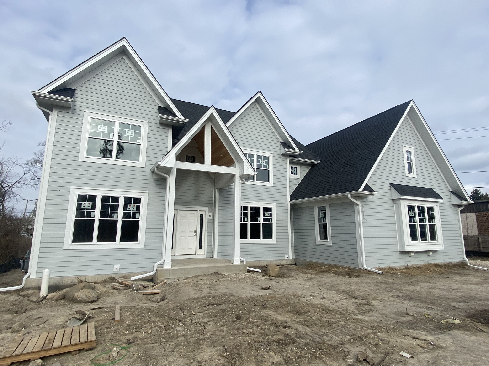 Clay Vinyl Windows from Midway Alliance installed by Northwind Exteriors in Wilmette, IL.