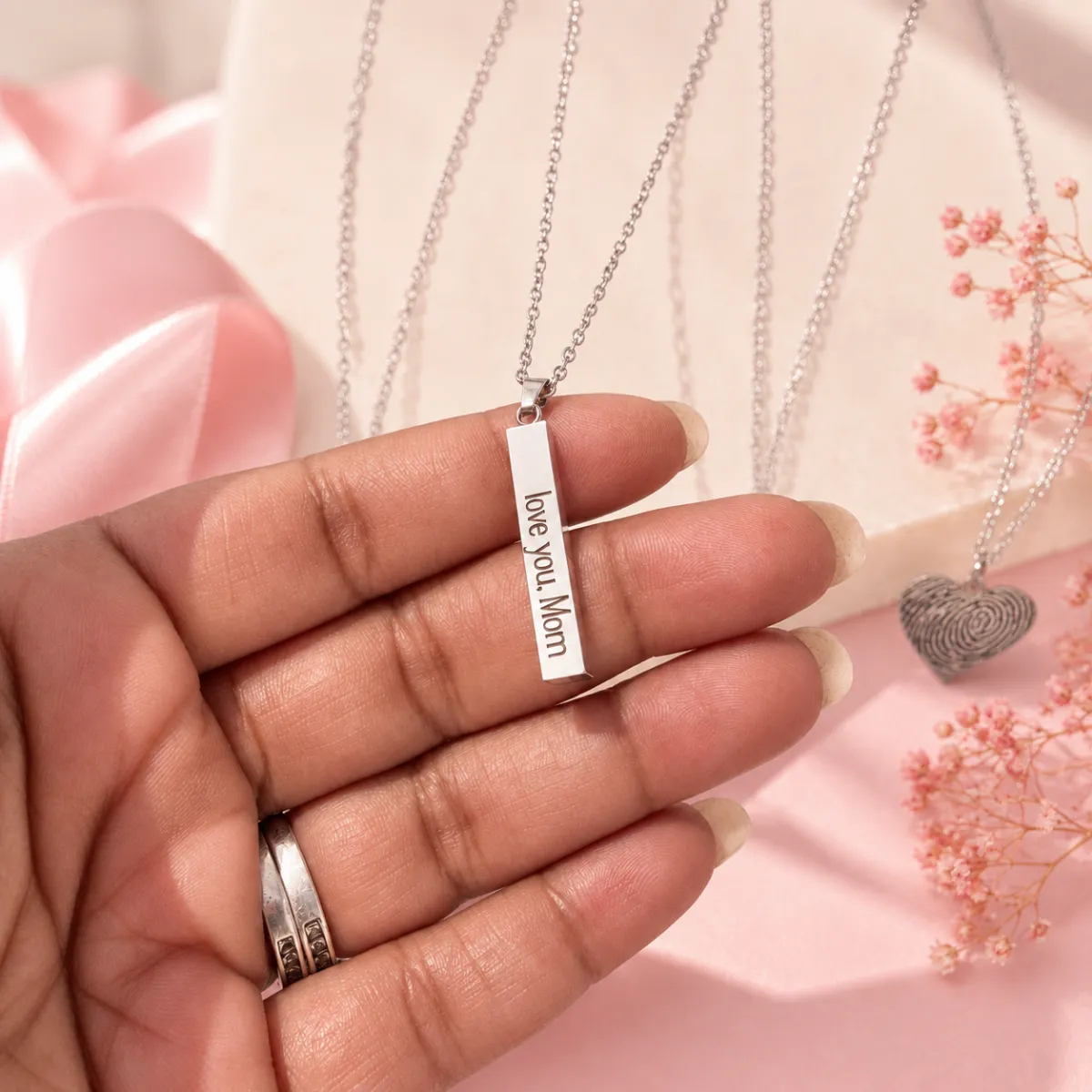 Custom stainless steel hesrt necklace with the name jasmina