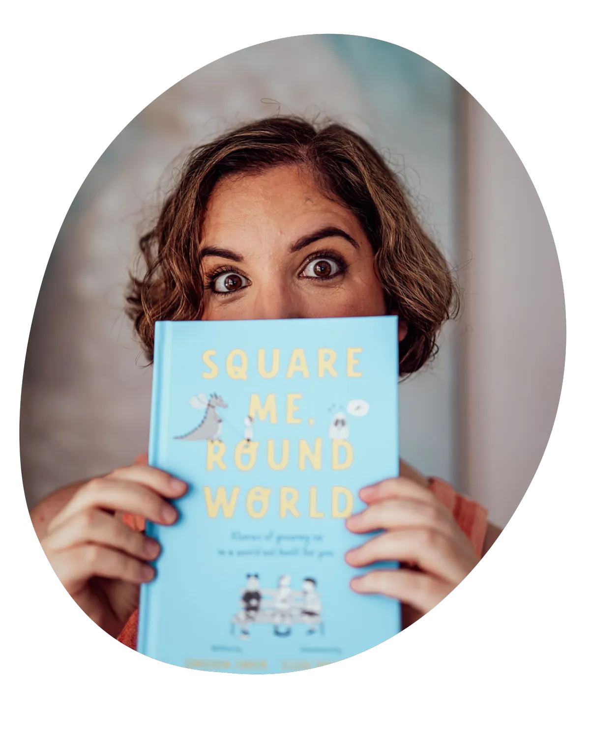 Chelsea Luker holding book square me round world