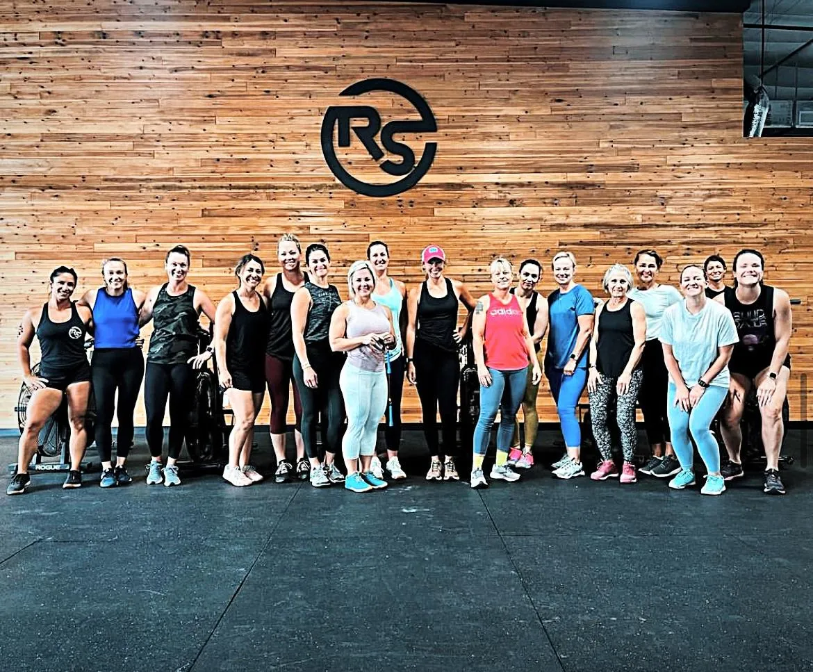 Rack Star Athletics class photo with all women