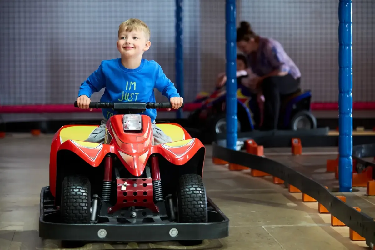 Children driving on the Go-Kart track