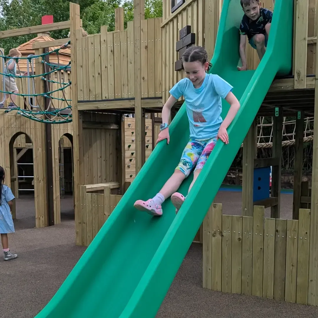 Outdoor Adventure Play area with slides and climbing frames