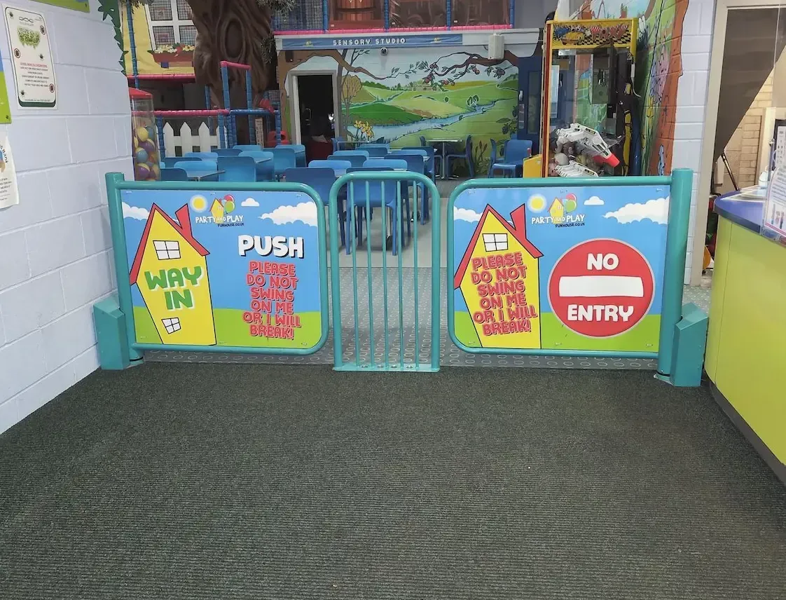 Customer entrance to Party and Play Funhouse showing the exterior sign