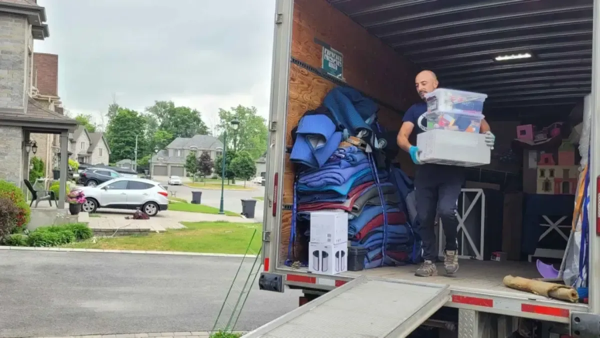 Professional movers wrapping furniture for local and long distance moving in Manchester CT