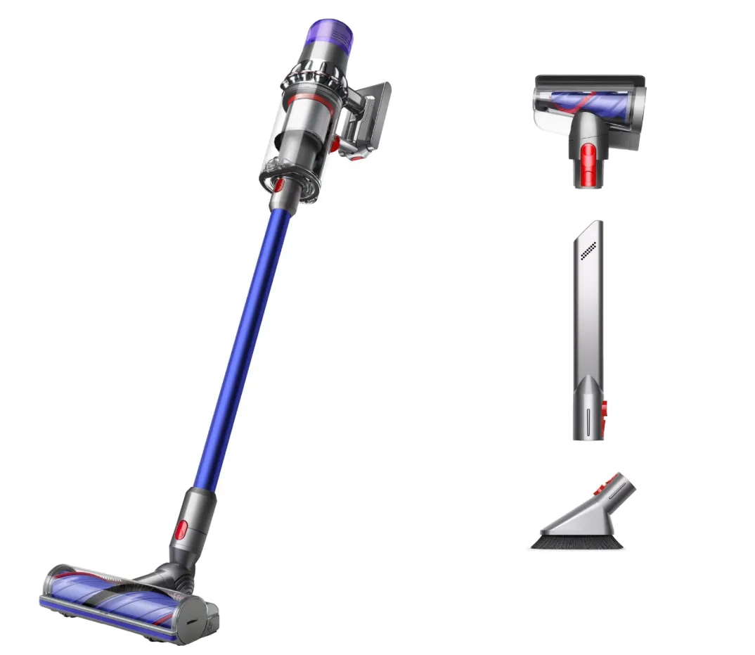 Laptop screen displaying code with glasses and plush toy.