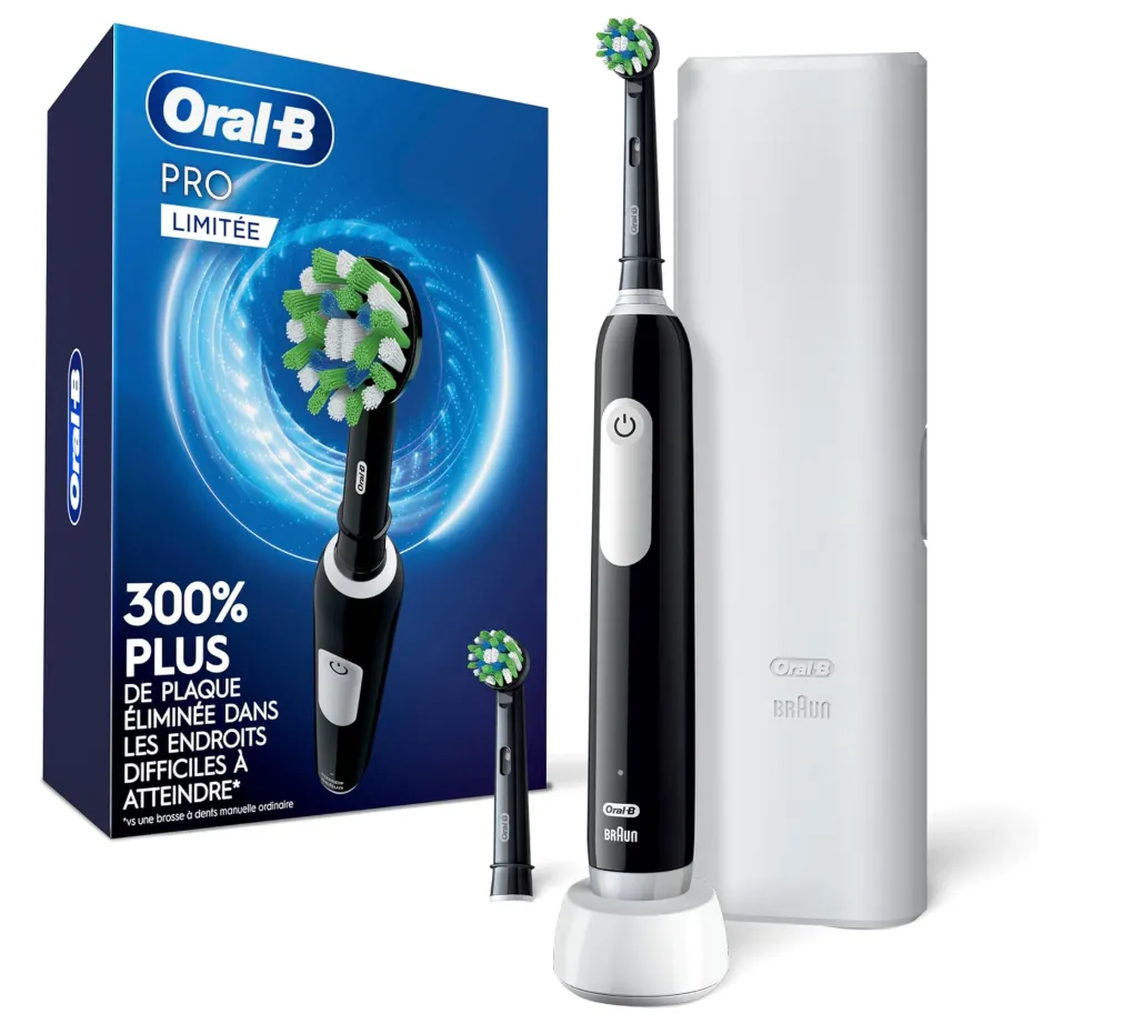 Laptop screen displaying code with glasses and plush toy.