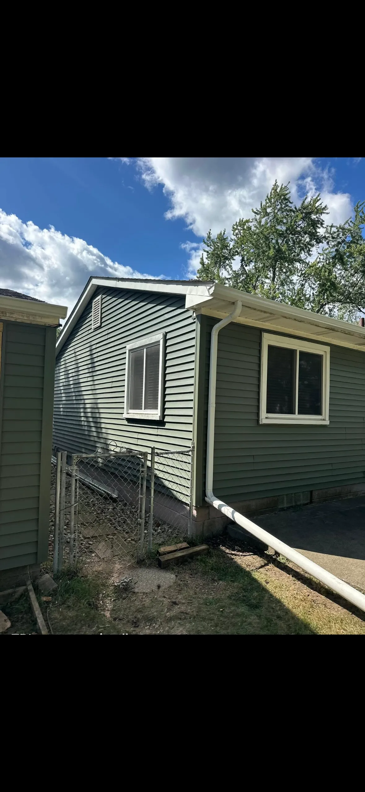 Vinyl siding, soffit and gutters on a Downriver Michigan home by TBL Construction