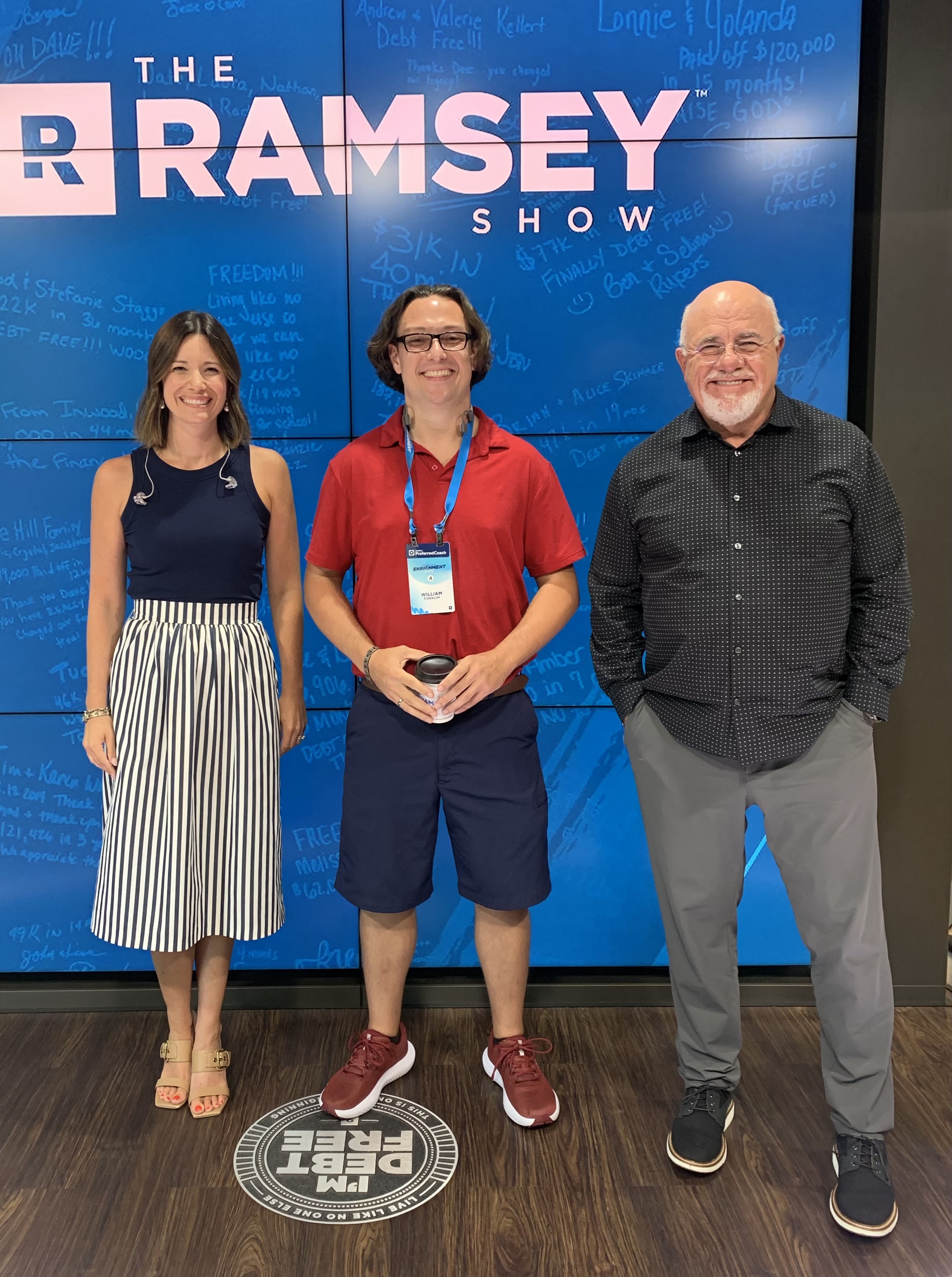 person holding black logitech cordless computer mouse