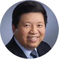 Dr. Low Peng Koon, resident dentist at Kong Dental Surgery in Singapore.