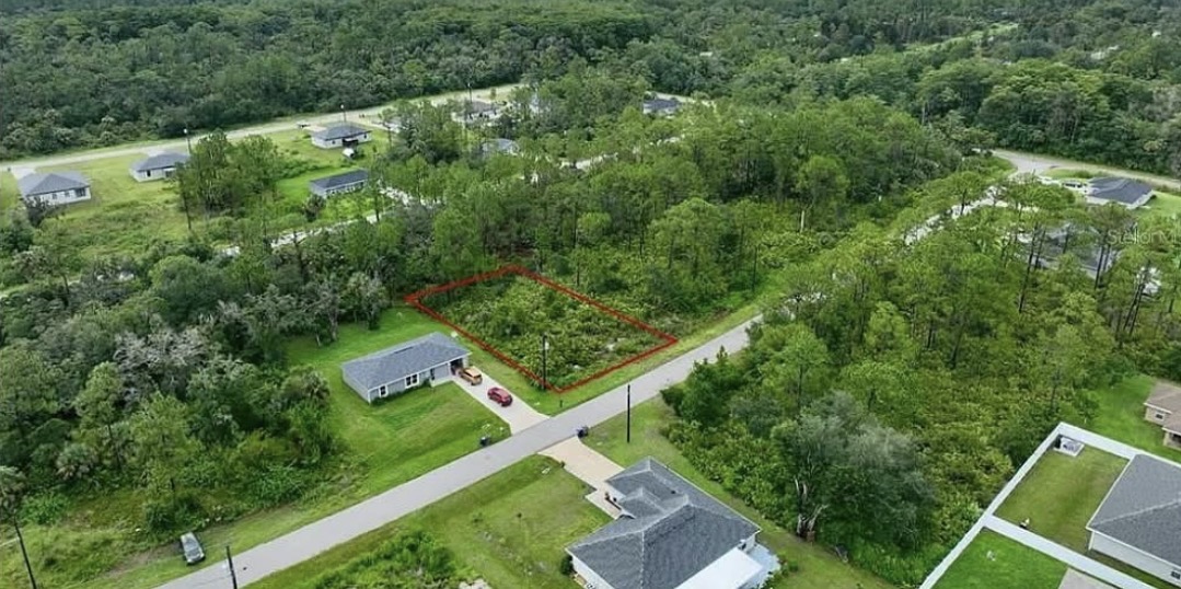a modern house with a large front yard